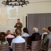 U.S. Air Force Col. Rusty Ballard speaks to a group of local politicians and citizens during exercise Air Defender 2023
