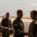 U.S. Air Force General Loh, director, Air National Guard, recognizes Airman's excellent service at Air Defender 2023