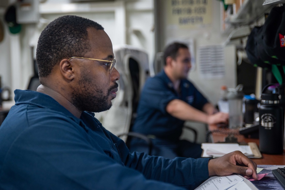 USS Ronald Reagan (CVN 76) Safety department Sailors process paper work