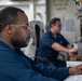 USS Ronald Reagan (CVN 76) Safety department Sailors process paper work