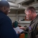 USS Ronald Reagan (CVN 76) Safety department Sailors process paper work