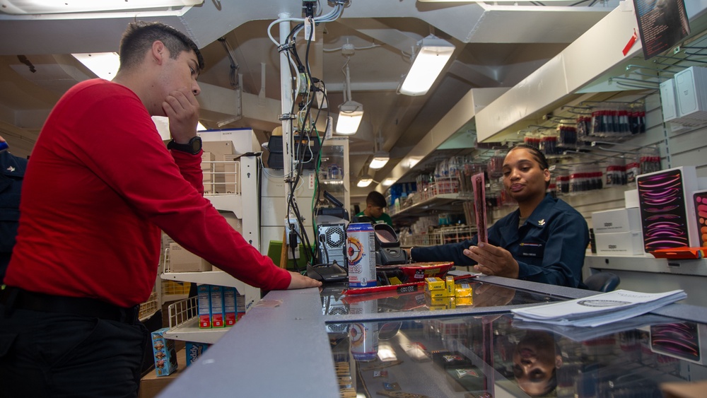 USS Ronald Reagan (CVN 76) Sailors man ship’s store.