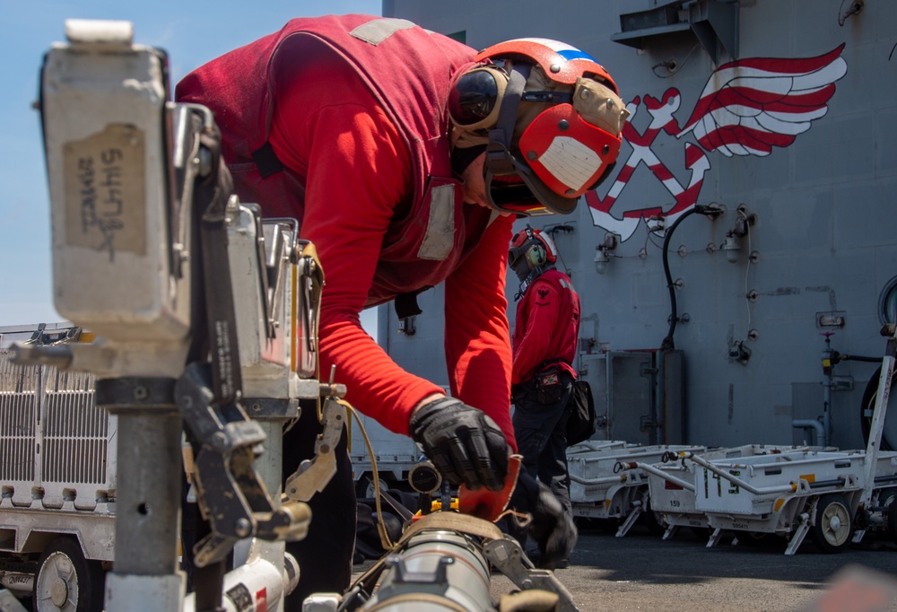 USS Ronald Reagan (CVN 76) Sailors conduct flight operations