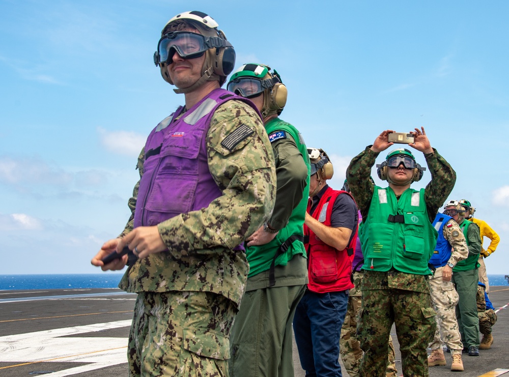 USS Ronald Reagan (CVN 76) Sailors host Multinational Defense Attaché