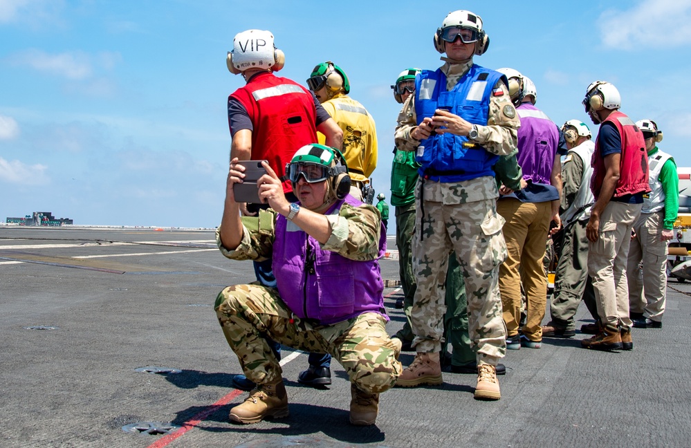USS Ronald Reagan (CVN 76) Sailors host Multinational Defense Attaché