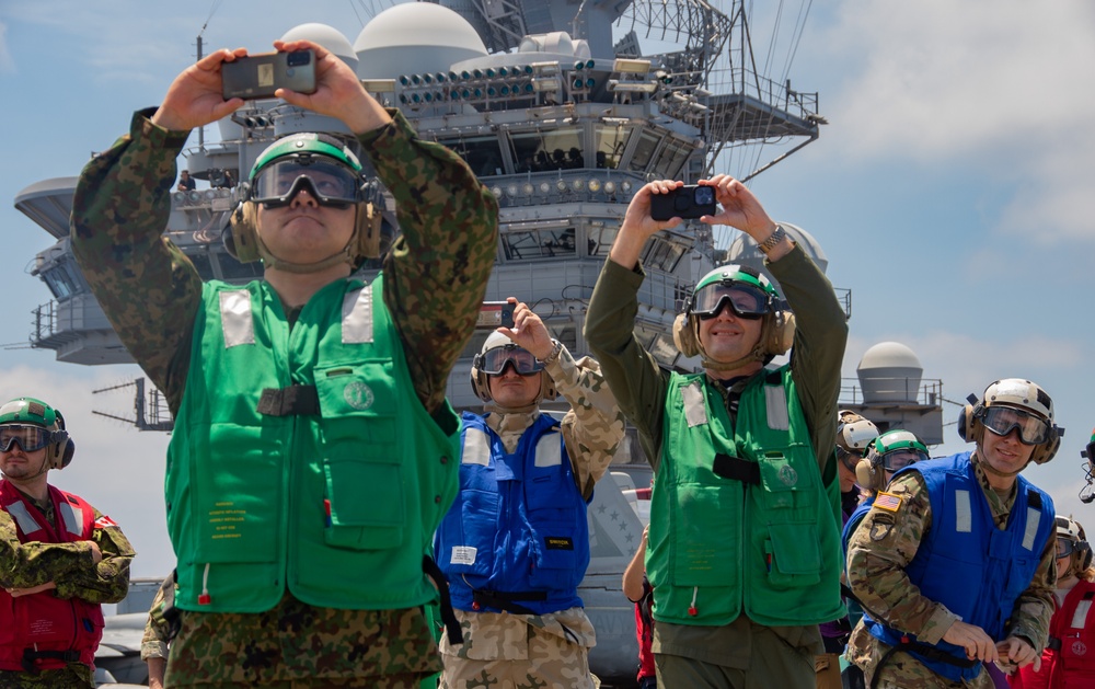 USS Ronald Reagan (CVN 76) Sailors host Multinational Defense Attaché