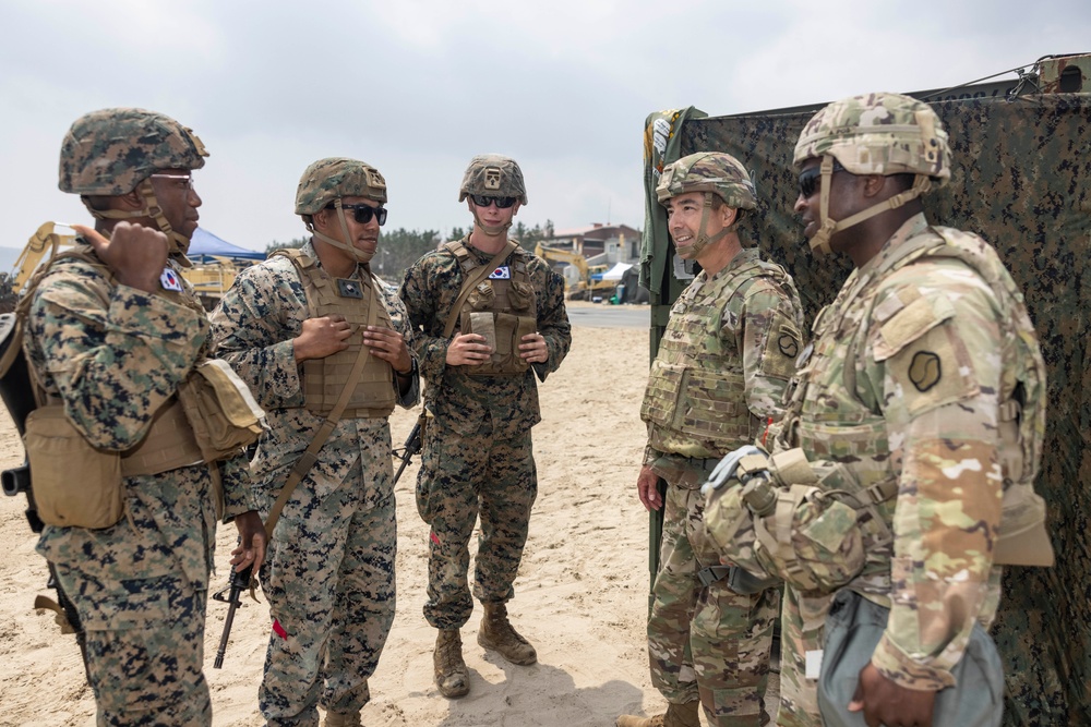 Distinguished Visitors arrive at Dogu Beach