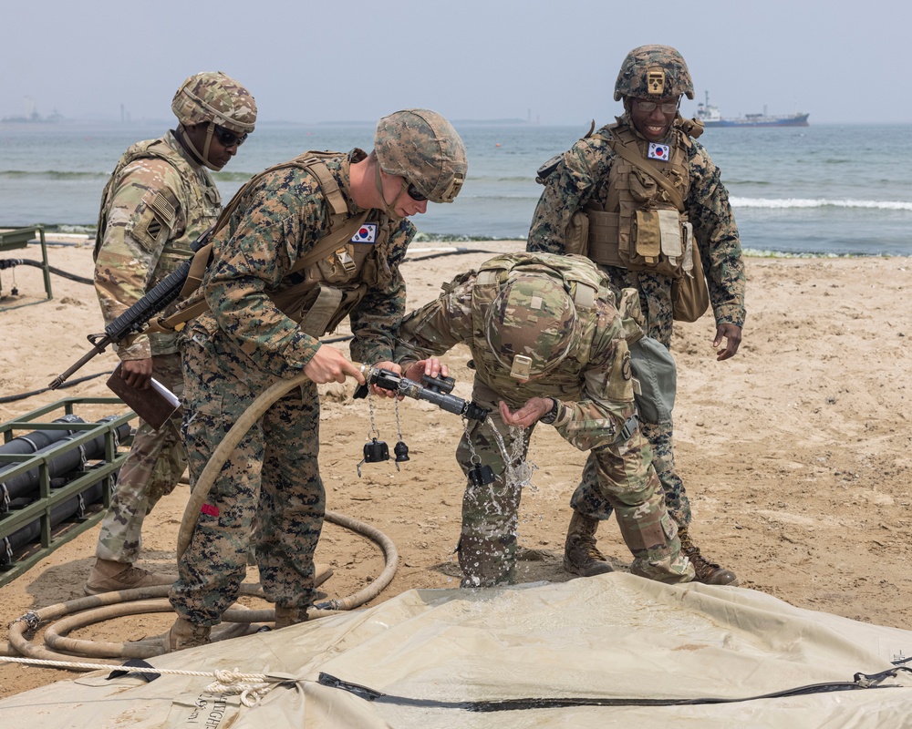 Distinguished Visitors arrive at Dogu Beach