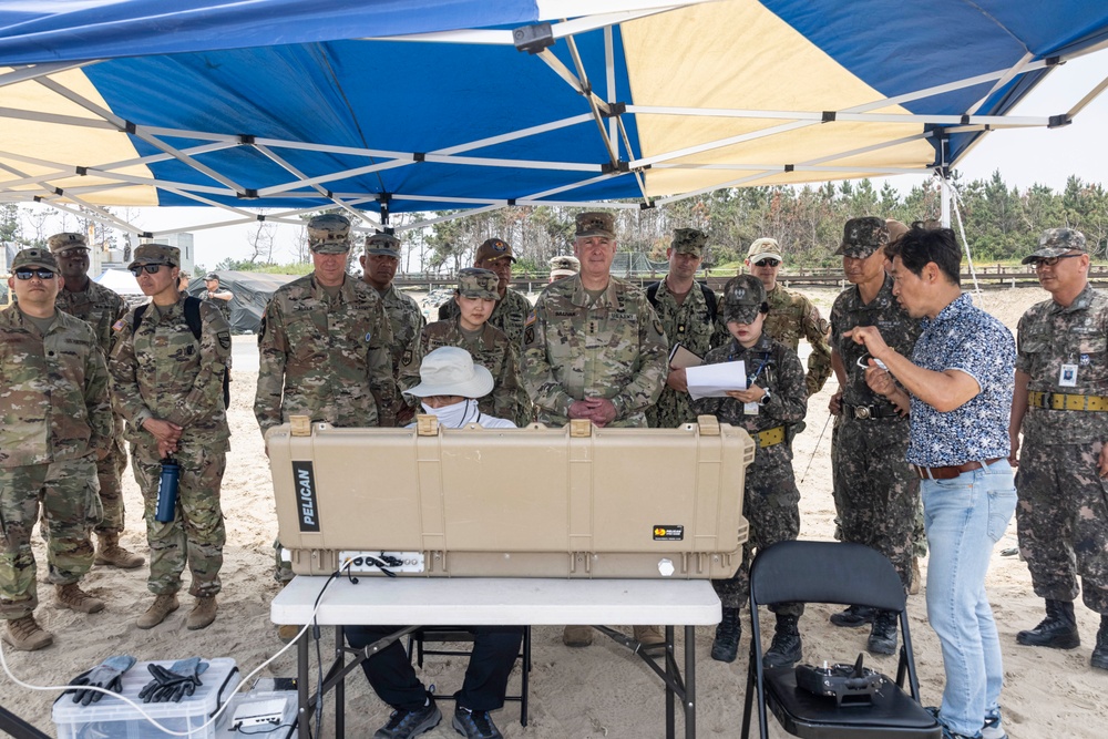 Distinguished Visitors arrive at Dogu Beach