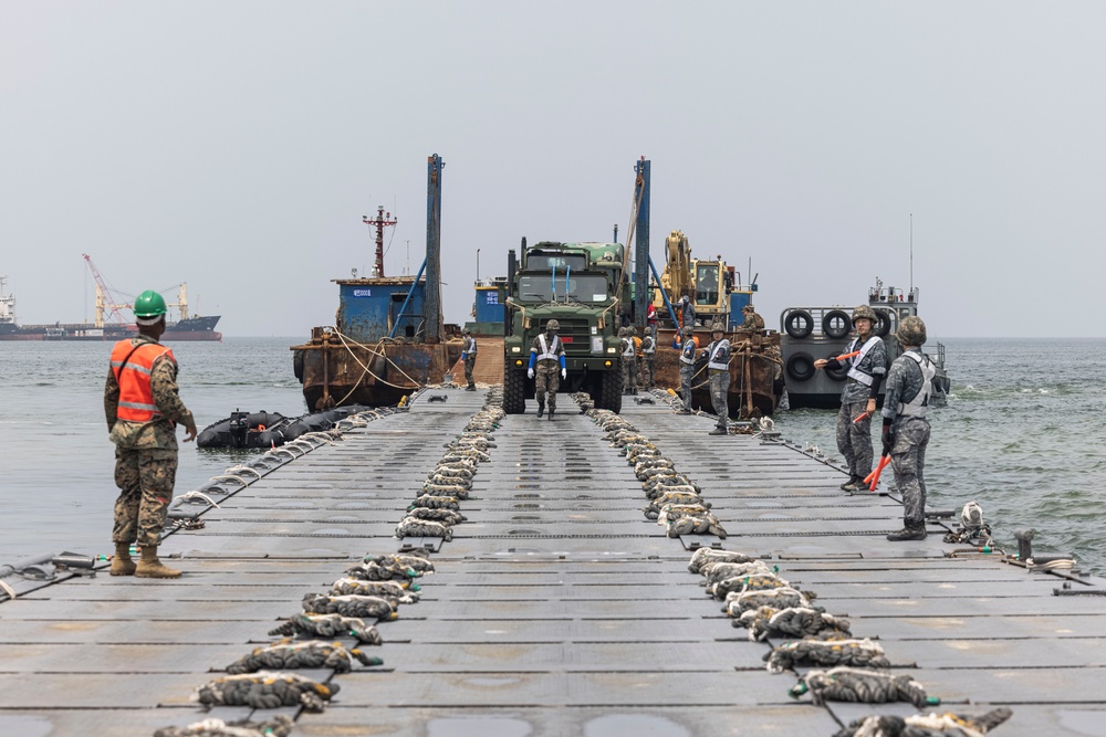 Distinguished Visitors arrive at Dogu Beach