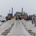 Distinguished Visitors arrive at Dogu Beach