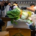 Unit Ministry Team and volunteers cook Kimchi for people in need of assistance.