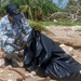 U.S. AND REPUBLIC OF SINGAPORE SAILORS AND AIRMEN PARTICIPATE IN BEACH CLEANUP