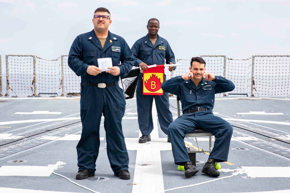 Sailors conduct simulated drills aboard USS Ralph Johnson (DDG 114), 27 June.