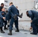 Sailors conduct simulated drills aboard USS Ralph Johnson (DDG 114), 27 June.