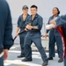 Sailors conduct simulated drills aboard USS Ralph Johnson (DDG 114), 27 June.