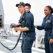 Sailors conduct simulated drills aboard USS Ralph Johnson (DDG 114), 27 June.