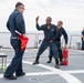 Sailors conduct simulated drills aboard USS Ralph Johnson (DDG 114), 27 June.