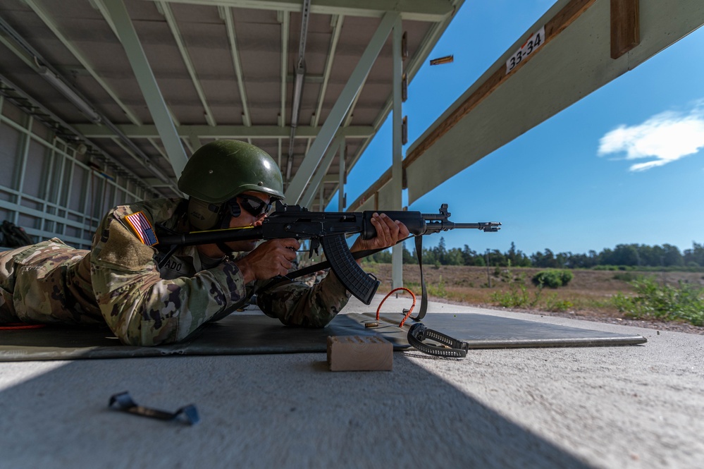 Army Reserve Capt. Steven Tirado fires a RK62 rifle