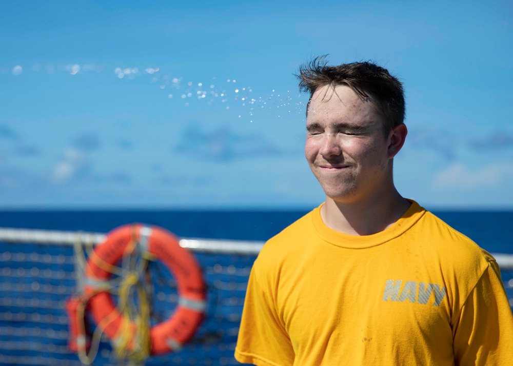 Sailors participate in an oleoresin capsicum (OC) course aboard USS Ralph Johnson (DDG 114), 28 June.