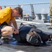 Sailors participate in an oleoresin capsicum (OC) course aboard USS Ralph Johnson (DDG 114), 28 June.