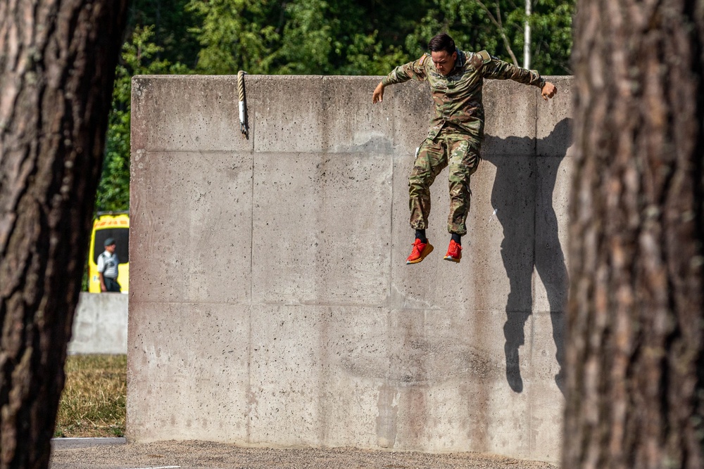 Army Reserve Sgt. Denzel Torres Jumps from an obstacle