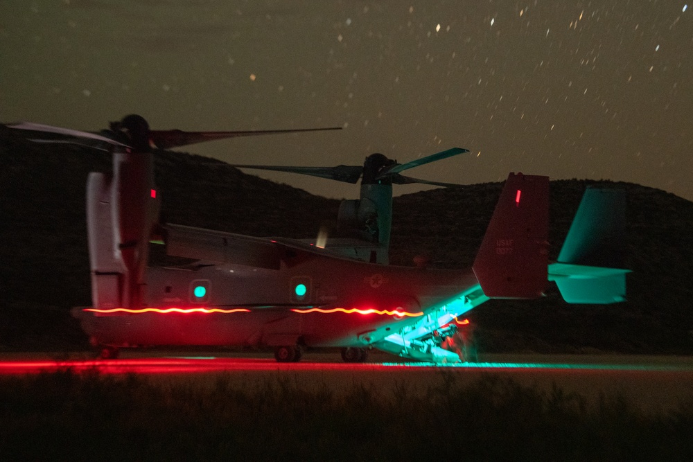 A C-146A Wolfhound and multiple CV-22 Ospreys play a part in a training exercise