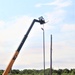 389th Engineer Company supports troop project to install light poles in Fort McCoy’s CRSP yard