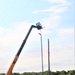 389th Engineer Company supports troop project to install light poles in Fort McCoy’s CRSP yard