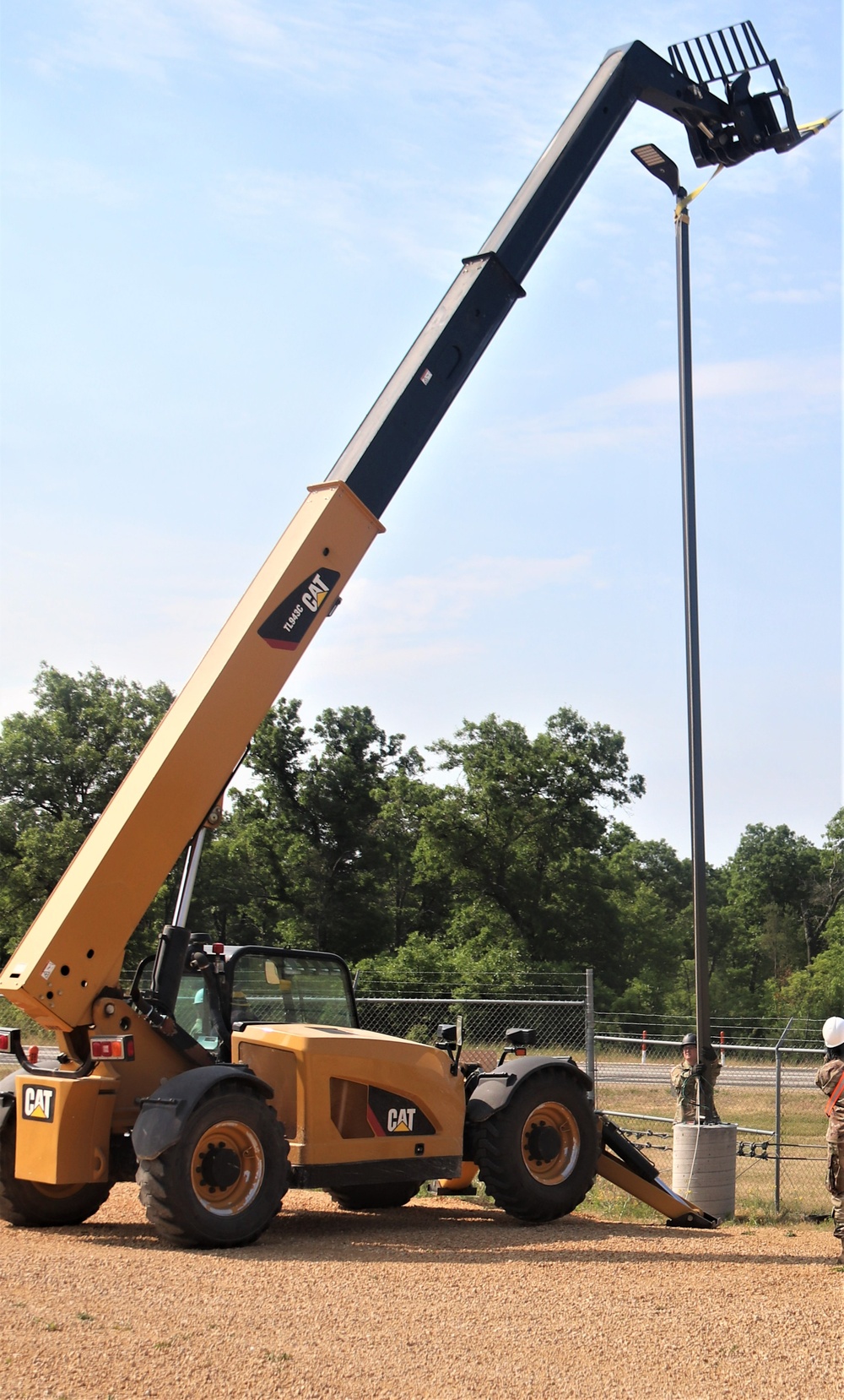 389th Engineer Company supports troop project to install light poles in Fort McCoy’s CRSP yard