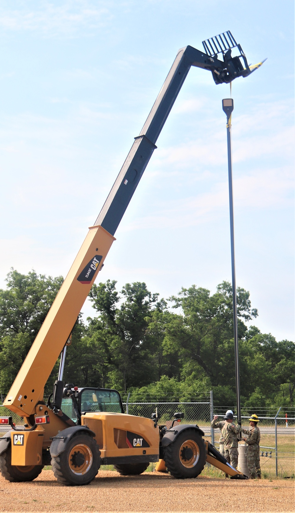 389th Engineer Company supports troop project to install light poles in Fort McCoy’s CRSP yard