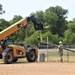 389th Engineer Company supports troop project to install light poles in Fort McCoy’s CRSP yard