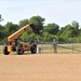 389th Engineer Company supports troop project to install light poles in Fort McCoy’s CRSP yard