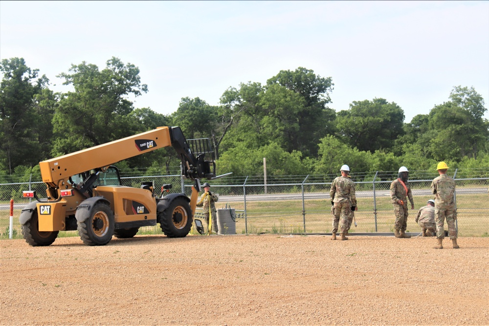 389th Engineer Company supports troop project to install light poles in Fort McCoy’s CRSP yard