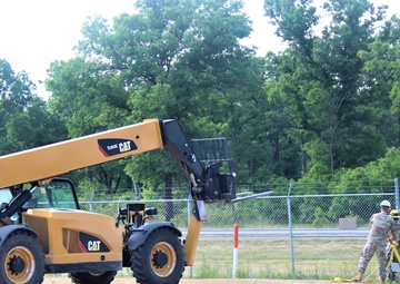 389th Engineer Company supports troop project to install light poles in Fort McCoy’s CRSP yard
