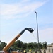 389th Engineer Company supports troop project to install light poles in Fort McCoy’s CRSP yard