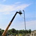 389th Engineer Company supports troop project to install light poles in Fort McCoy’s CRSP yard