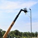 389th Engineer Company supports troop project to install light poles in Fort McCoy’s CRSP yard