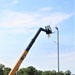 389th Engineer Company supports troop project to install light poles in Fort McCoy’s CRSP yard