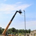 389th Engineer Company supports troop project to install light poles in Fort McCoy’s CRSP yard