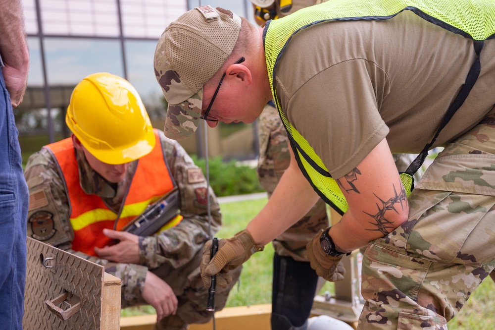 Civil engineer Airmen provide hailstorm damage cleanup