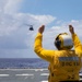 Sailors conduct flight quarters aboard USS Ralph Johnson (DDG 114), 29 June.