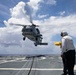 Sailors conduct flight quarters aboard USS Ralph Johnson (DDG 114), 29 June.