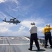 Sailors conduct flight quarters aboard USS Ralph Johnson (DDG 114), 29 June.