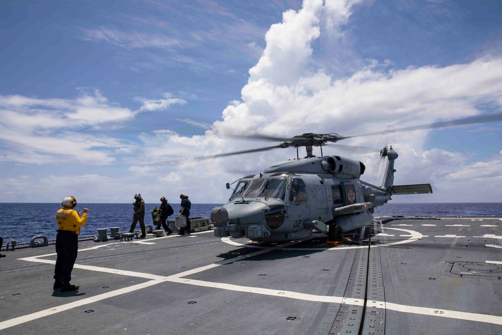 Sailors conduct flight quarters aboard USS Ralph Johnson (DDG 114), 29 June.