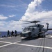 Sailors conduct flight quarters aboard USS Ralph Johnson (DDG 114), 29 June.