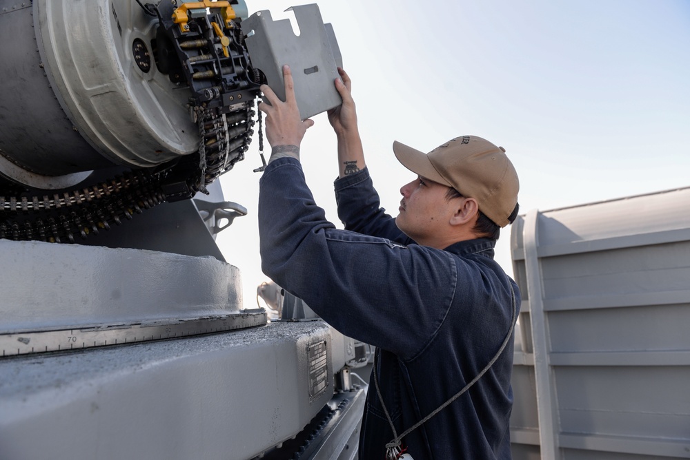 Boxer Fire Controlman Conducts Maintenance