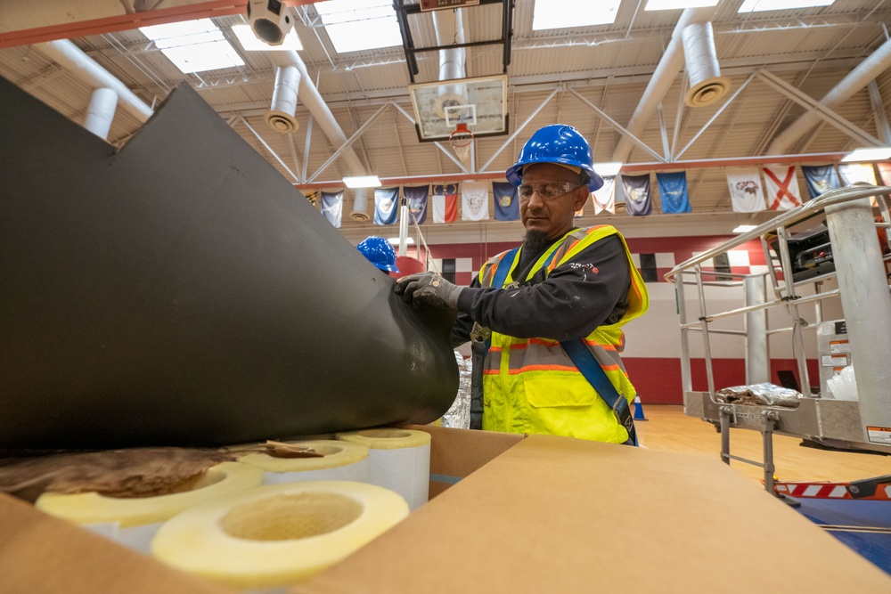 HVAC techs repair at JBSA