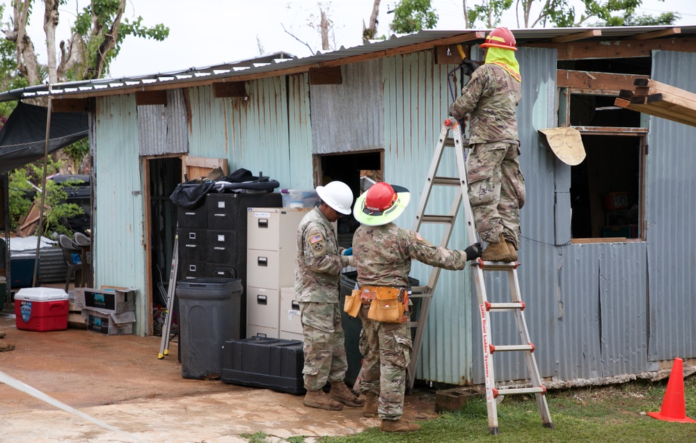 Task Force RISEUP completes 100th temporary, emergency roof installation in Guam - 2