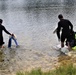 Fort McCoy biologists go diving to curb invasive plant species